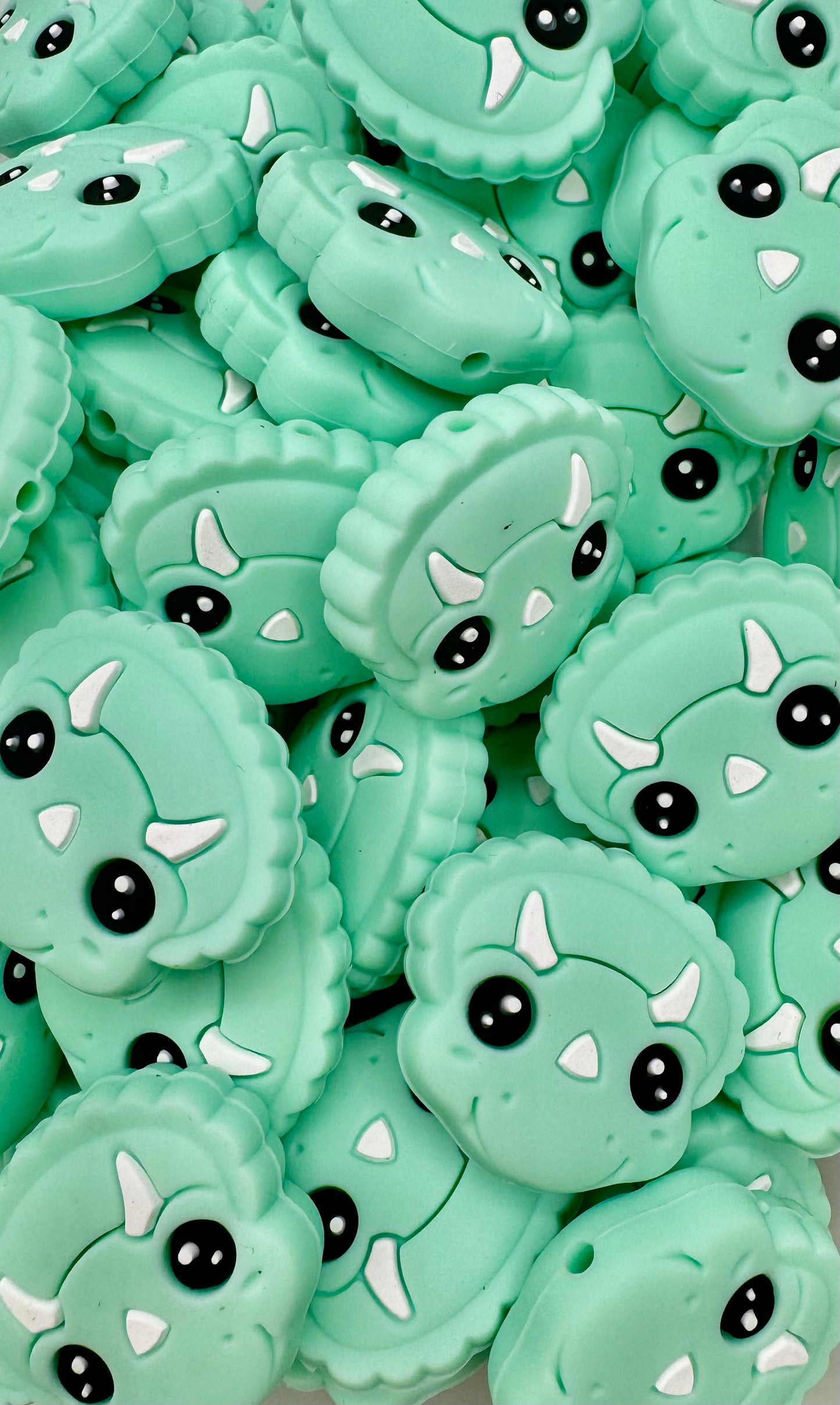 Perle focale dinosaure Cera