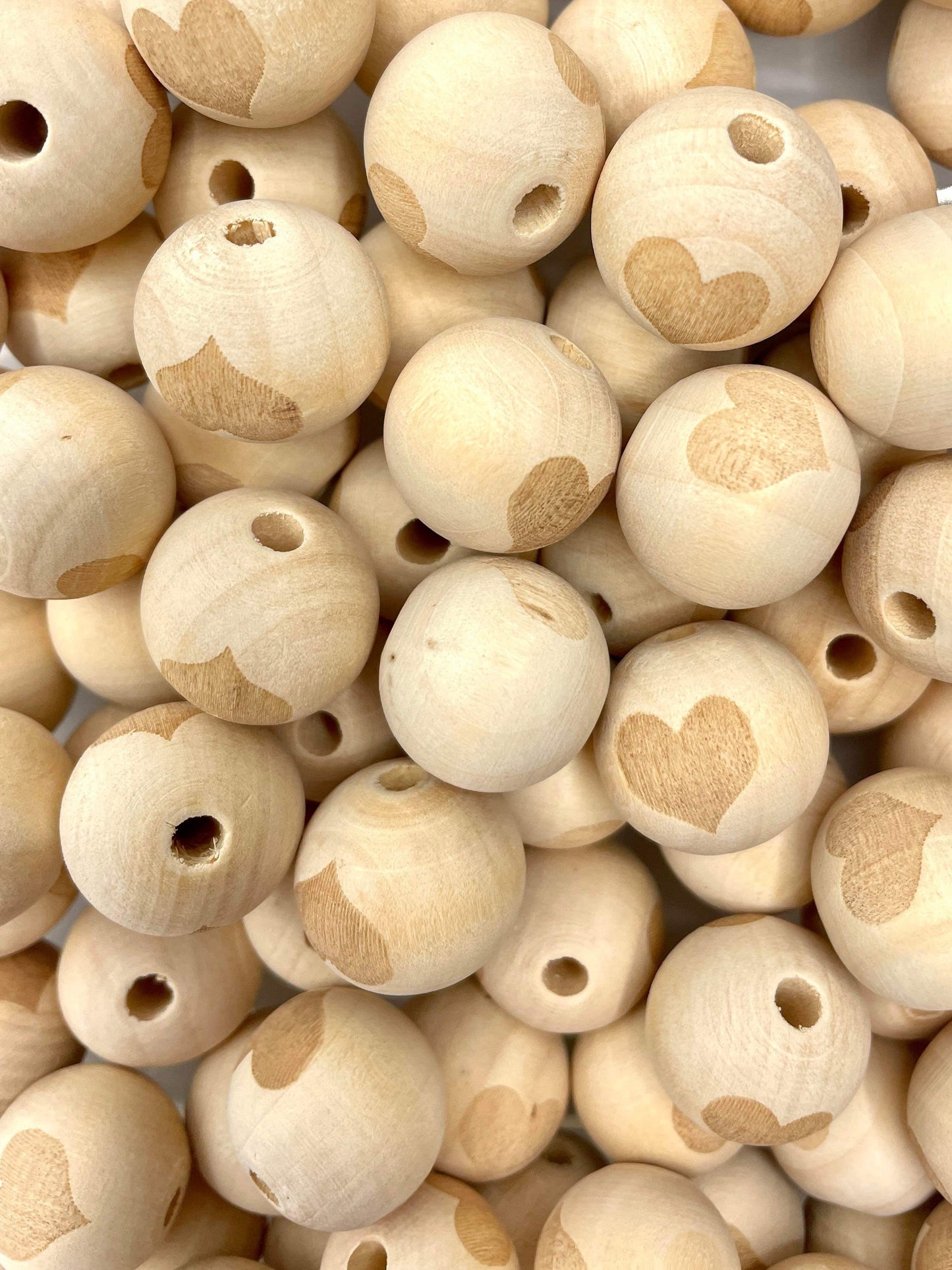 Perle en bois coeur 20 mm