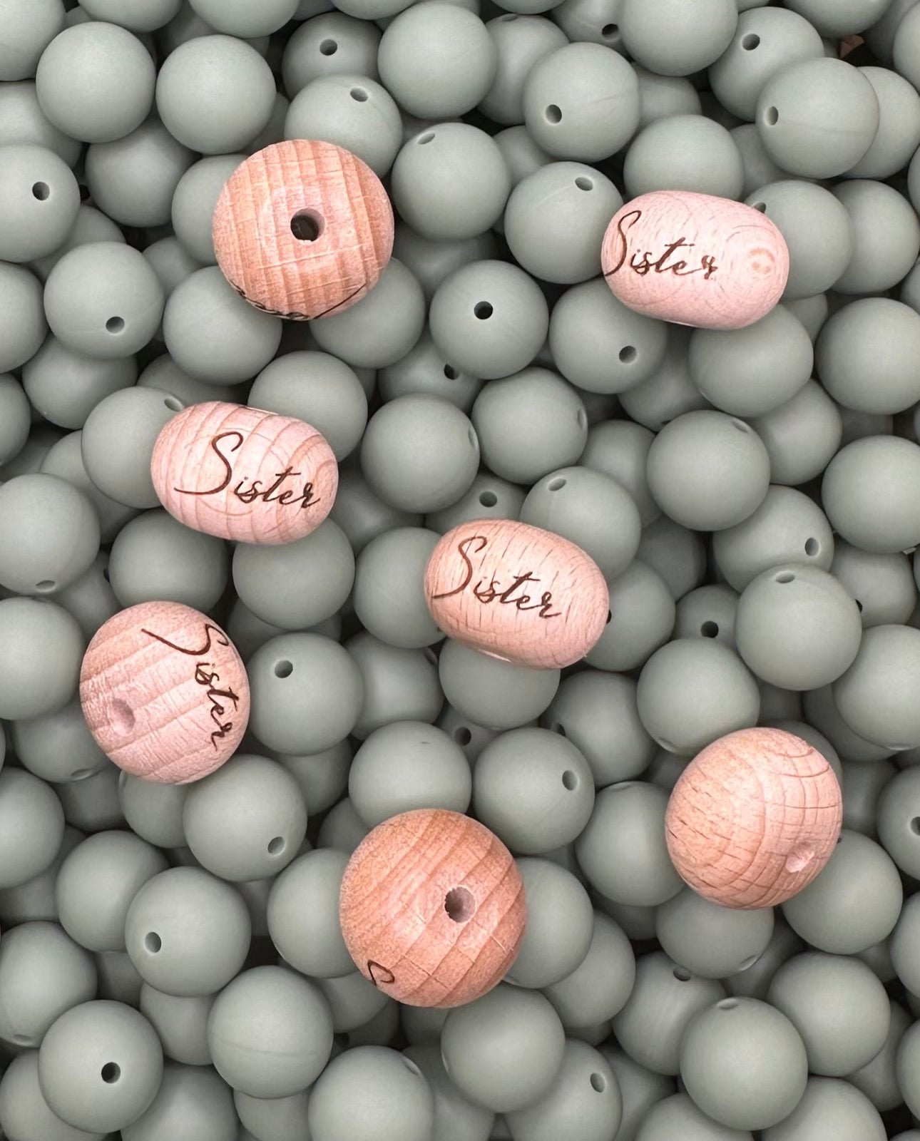 Perle en bois gravée boulier de 22 mm