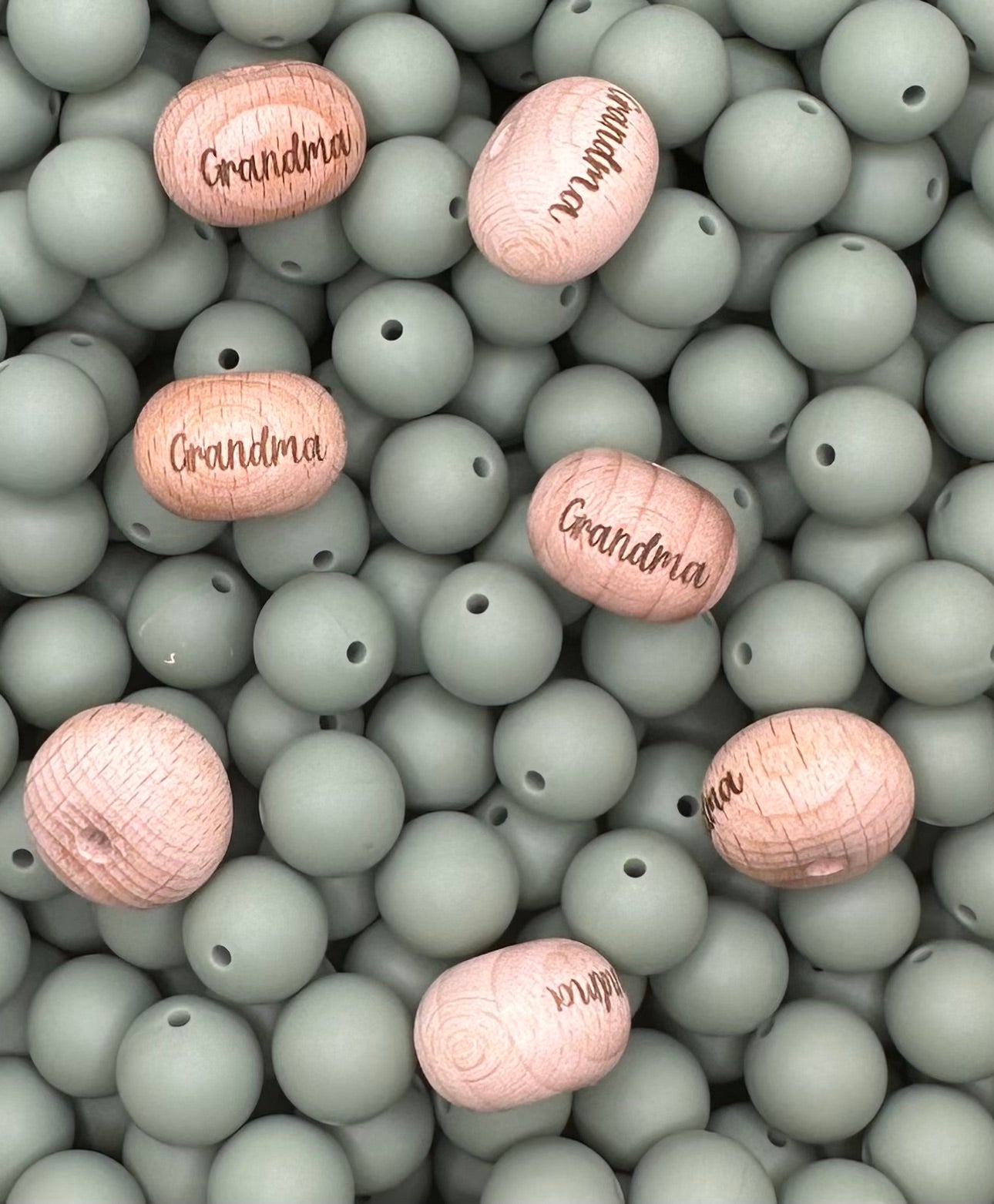 Perle en bois gravée boulier de 22 mm