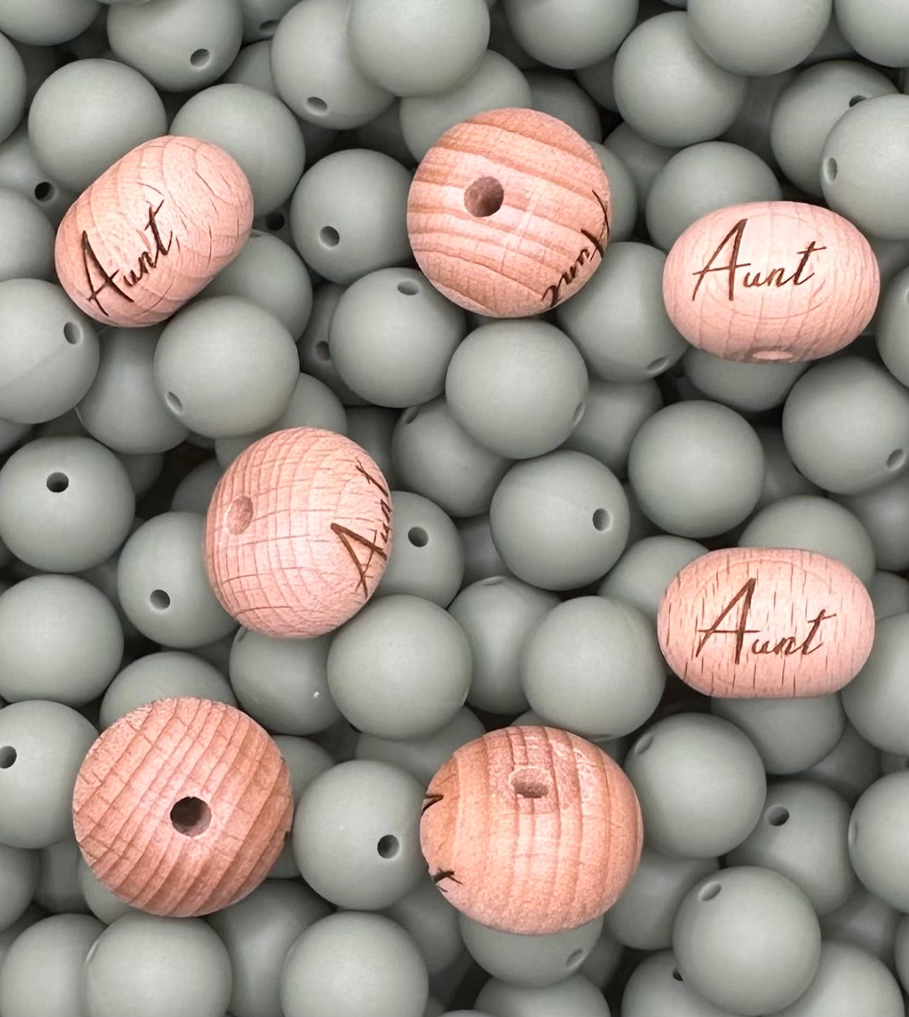 Perle en bois gravée boulier de 22 mm