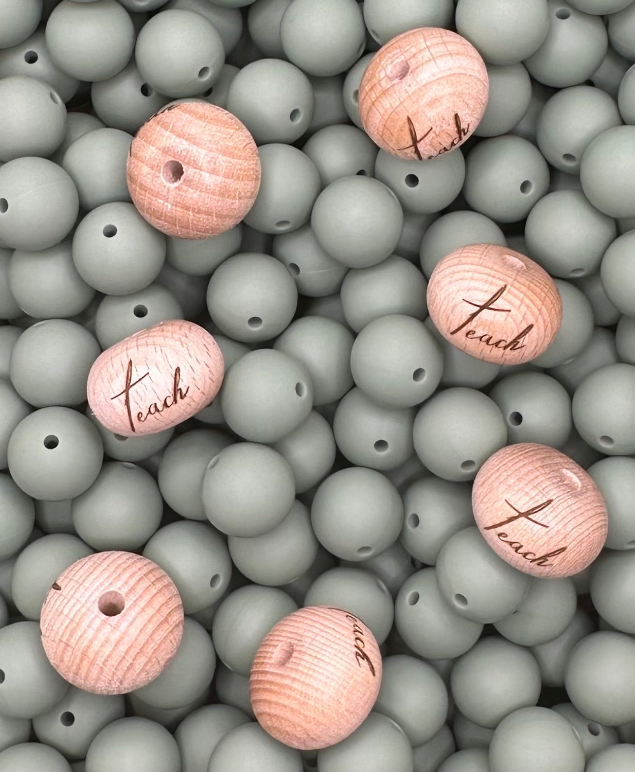 Perle en bois gravée boulier de 22 mm