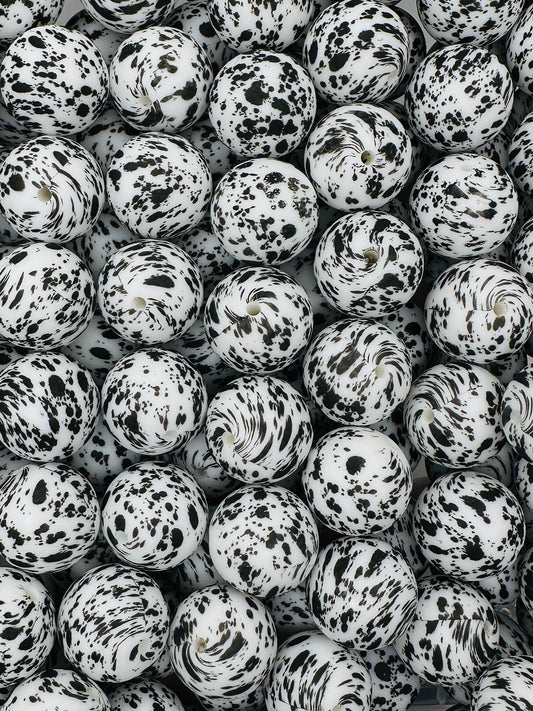 Perle imprimée éclaboussures noires de 19 mm