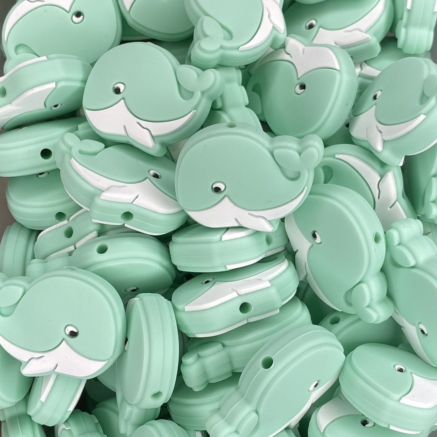 Perle focale de baleine souriante