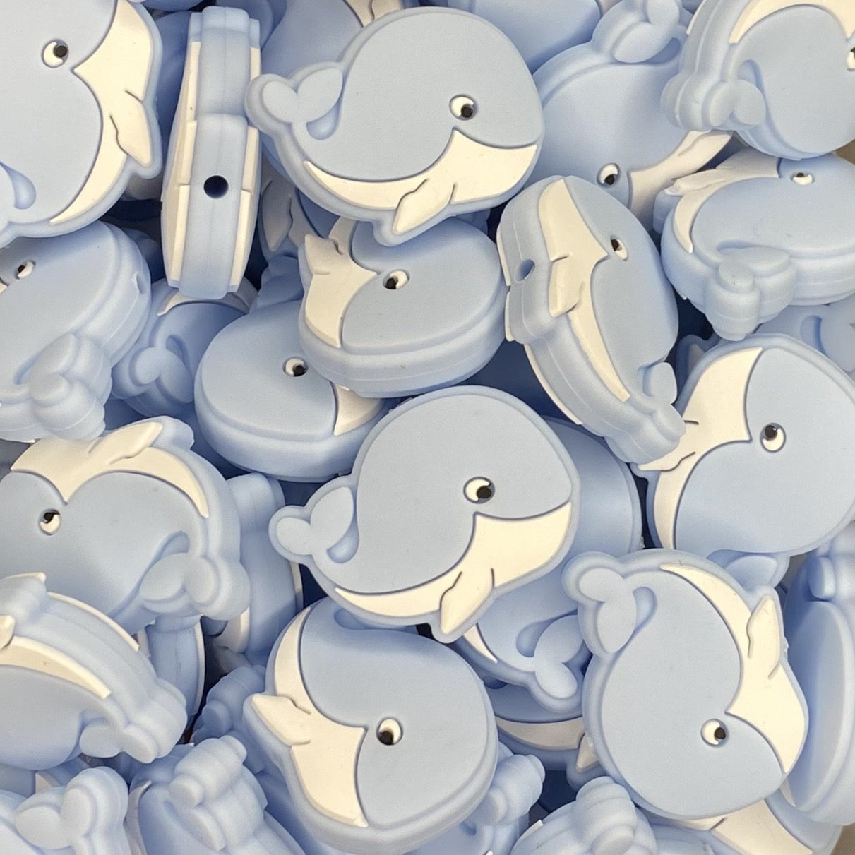 Perle focale de baleine souriante