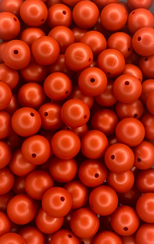 Perle rouge métallisé de 15 mm