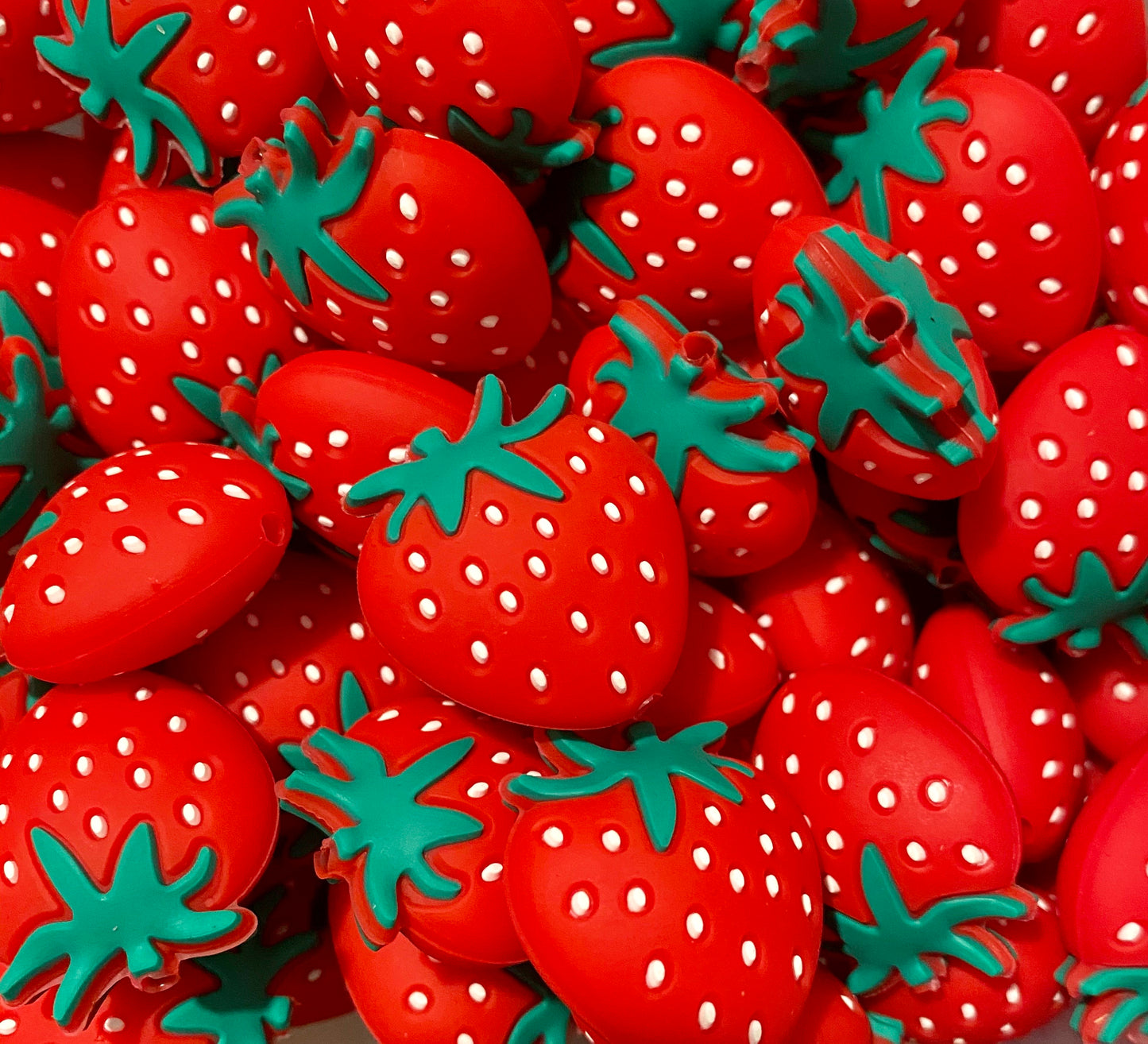 Perle focale fraise