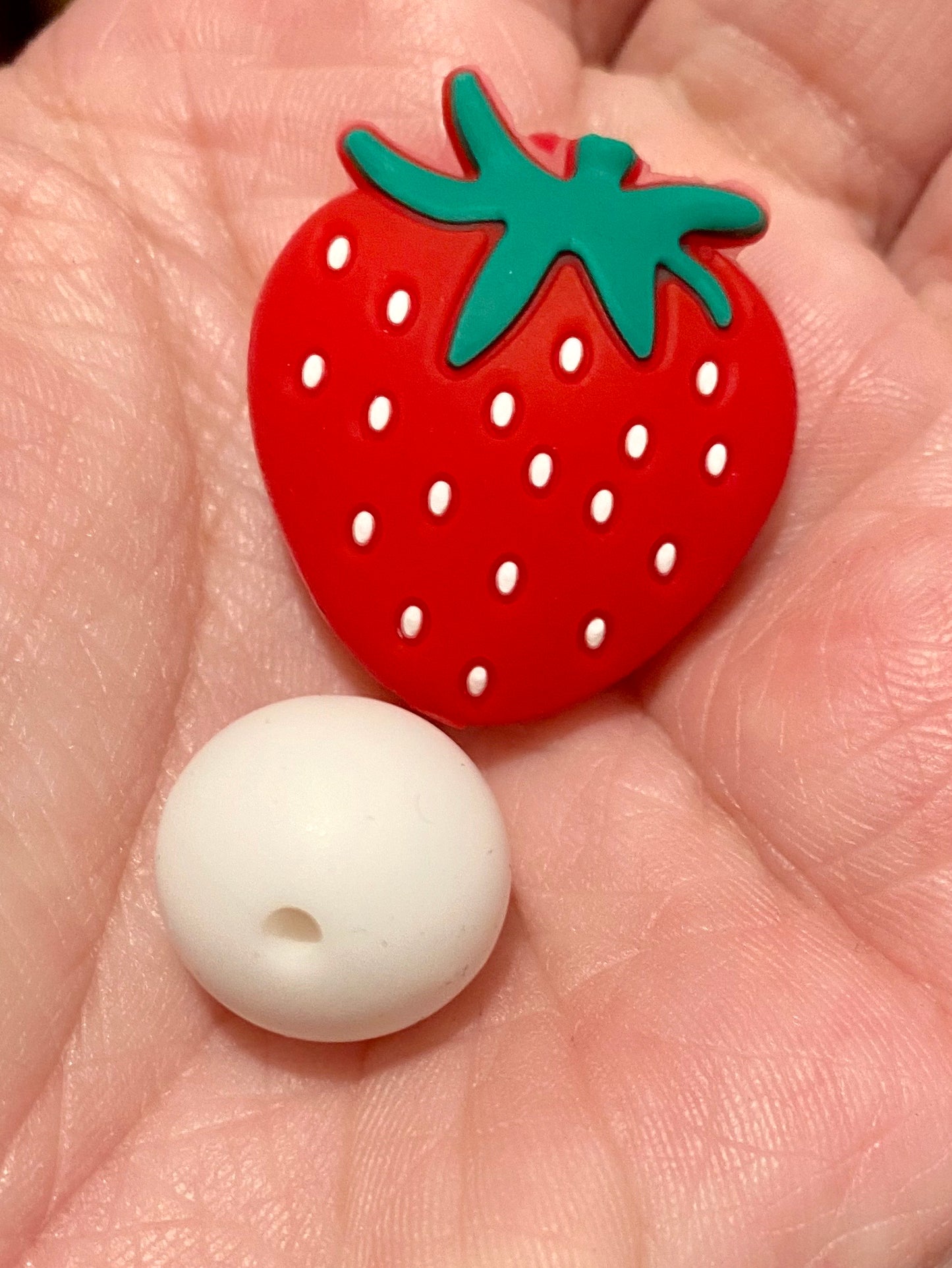 Perle focale fraise