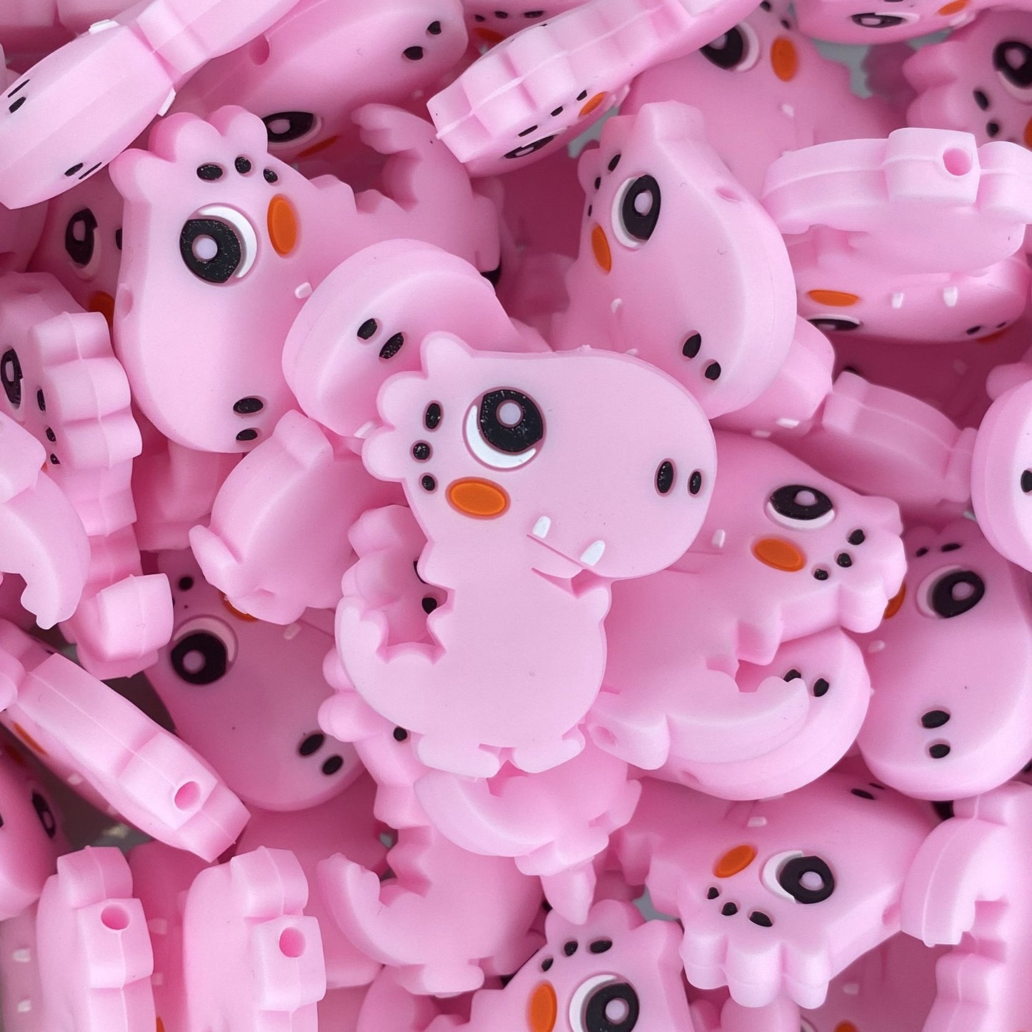Perle focale Dino dansant