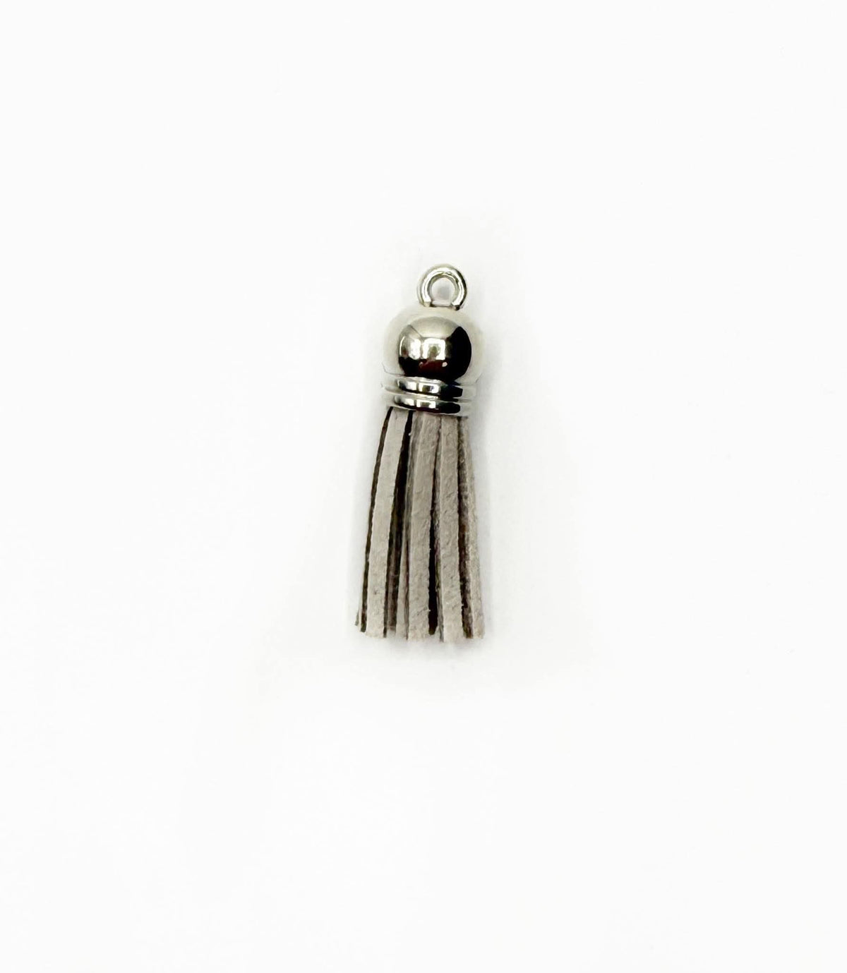 Petits pompons en cuir argenté