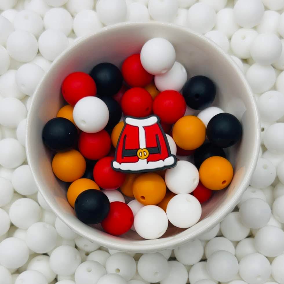 Perle focale du manteau du Père Noël