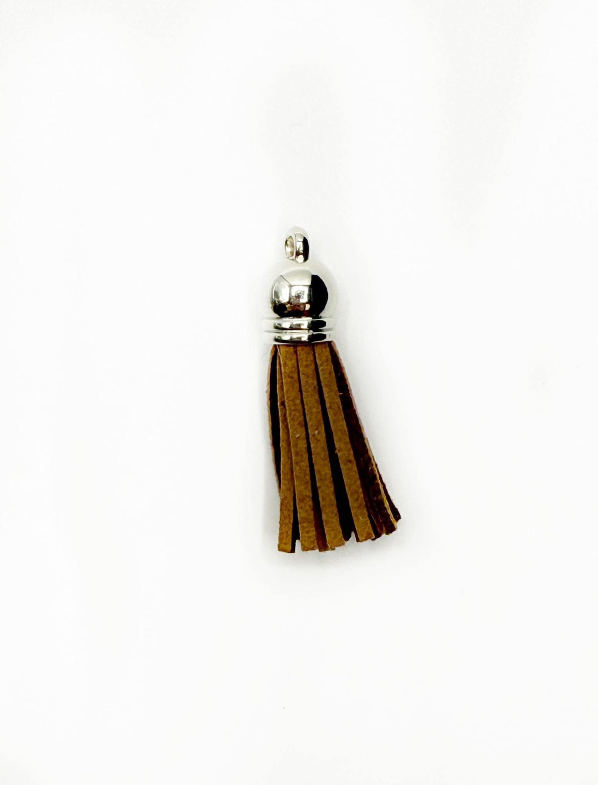 Petits pompons en cuir argenté