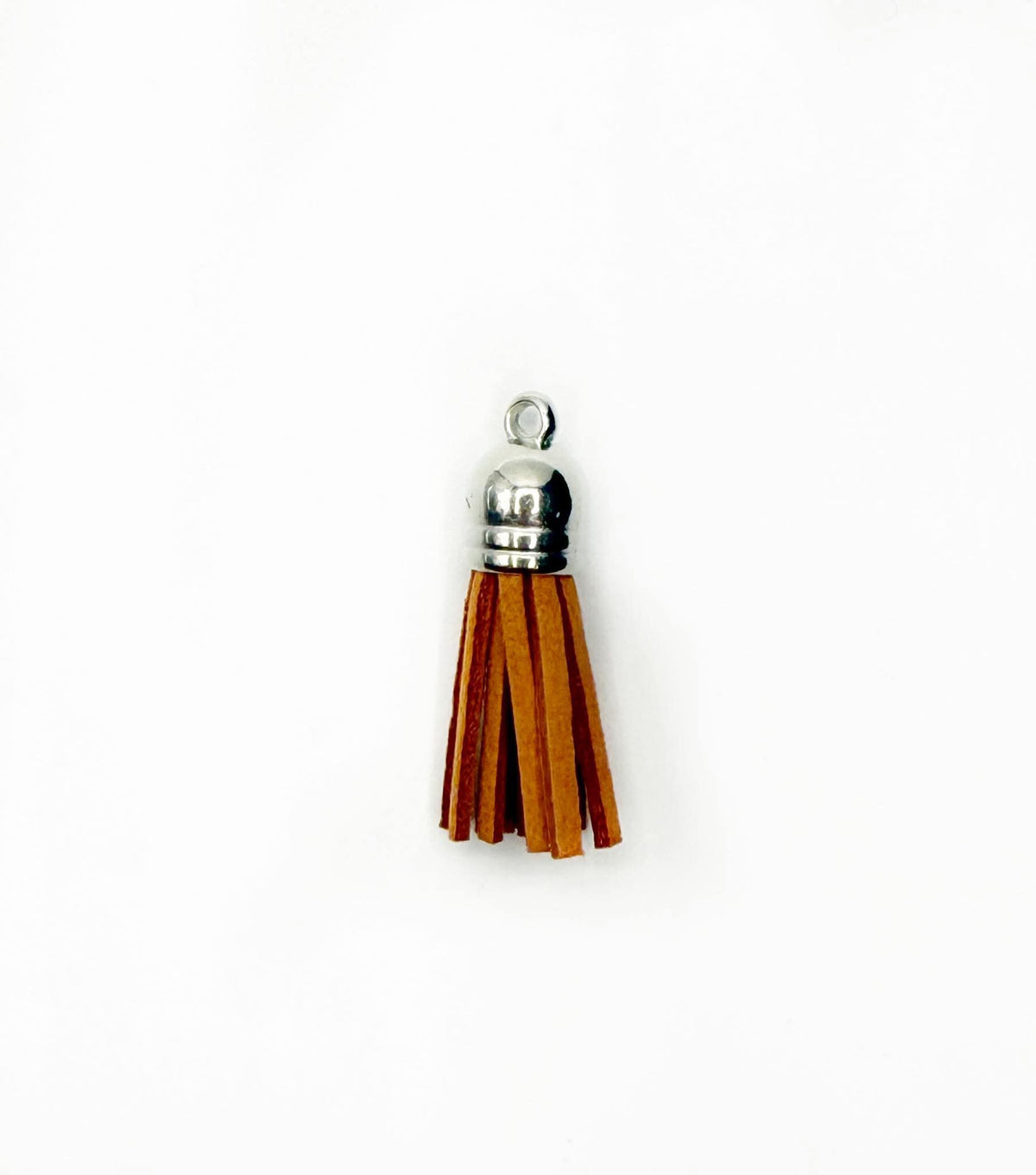 Petits pompons en cuir argenté