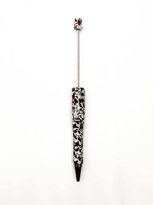 Création CTS : perles en plastique imprimées de vache brune **Brevet en instance**