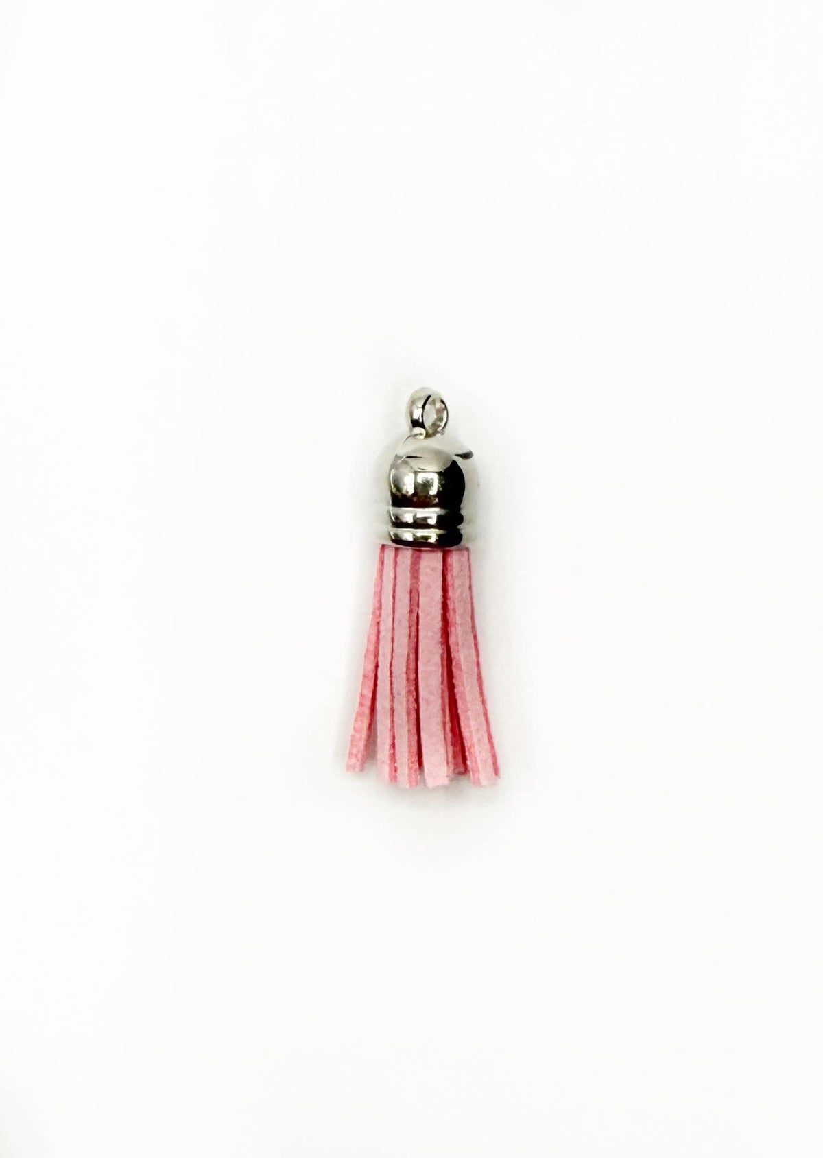 Petits pompons en cuir argenté