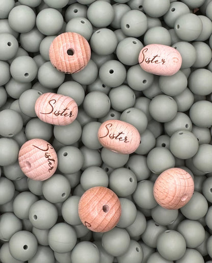 Perle en bois gravée boulier de 22 mm