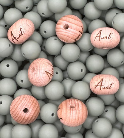 Perle en bois gravée boulier de 22 mm