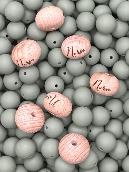 Perle en bois gravée boulier de 22 mm