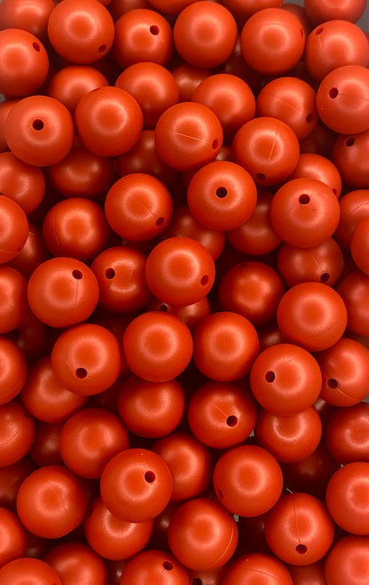 Perle rouge métallisé de 15 mm